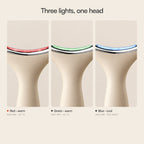 The metal head of Loomi Glide lit in its three modes: red with warmth, green with warmth, blue with no heat.
