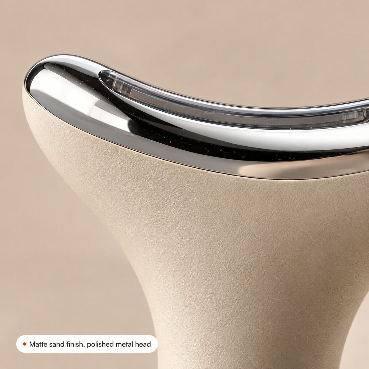Close-up of the matte sand finish meeting the polished metal head of Loomi Glide.