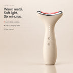 Loomi Glide standing upright on a beige backdrop: warm metal, soft light, six minutes; in the box, the device, a USB‑C cable and the manual; 30-day returns.